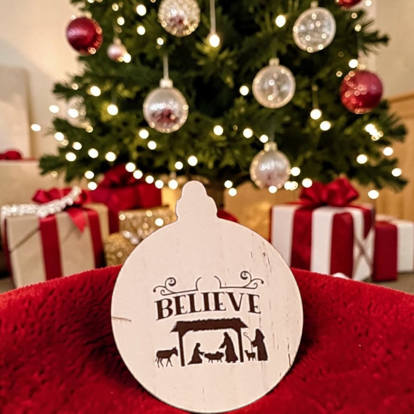 Believe Nativity wood Christmas ornament with Mary Joseph and Baby Jesus manger scene