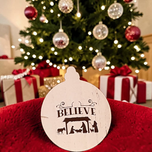 Believe Nativity wood Christmas ornament with Mary Joseph and Baby Jesus manger scene