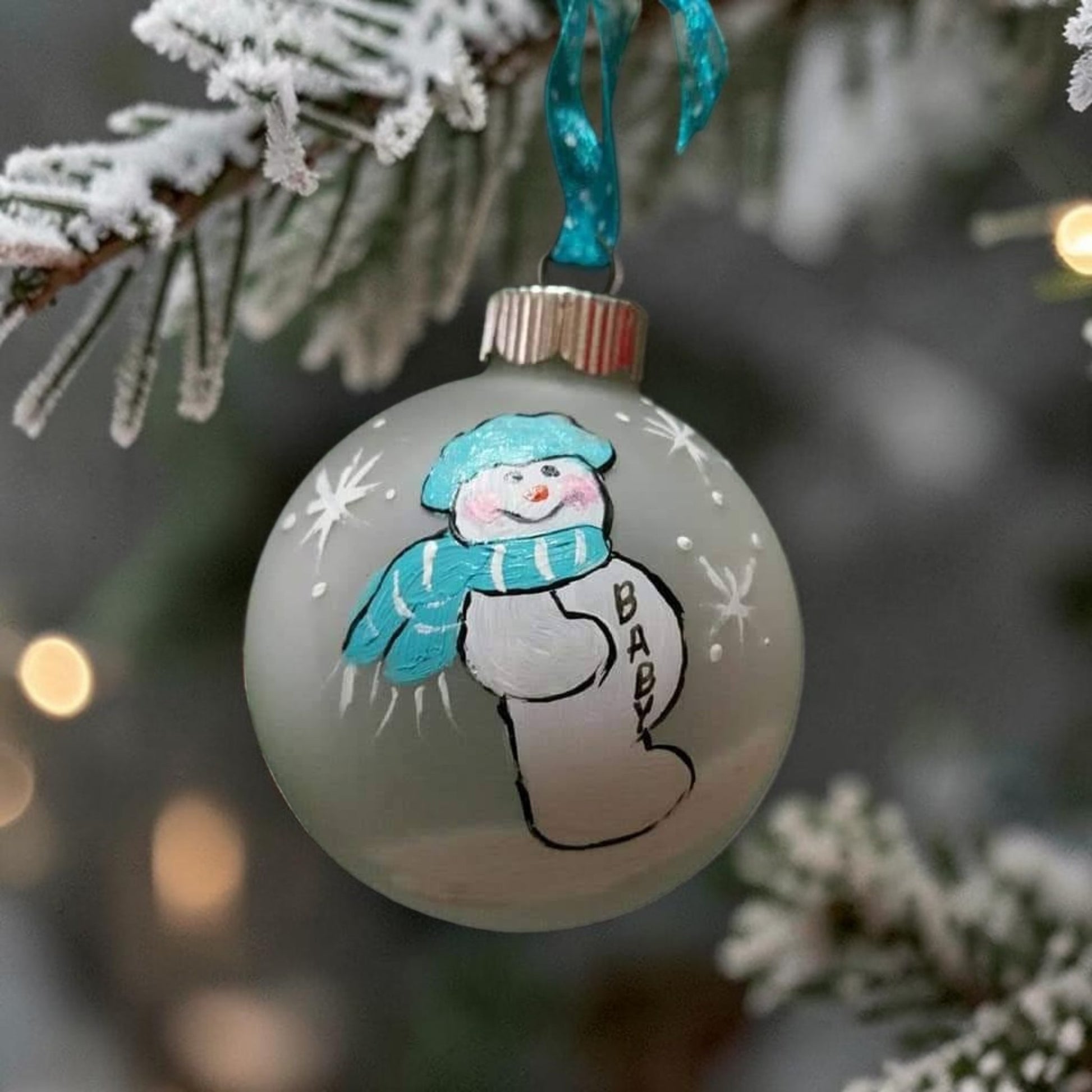 Hand-painted expecting mom snowman glass Christmas ornament with turquoise hat and scarf